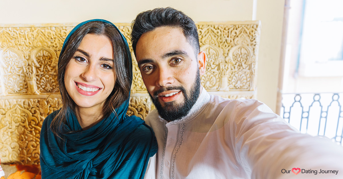 Muslim woman and man taking a selfie